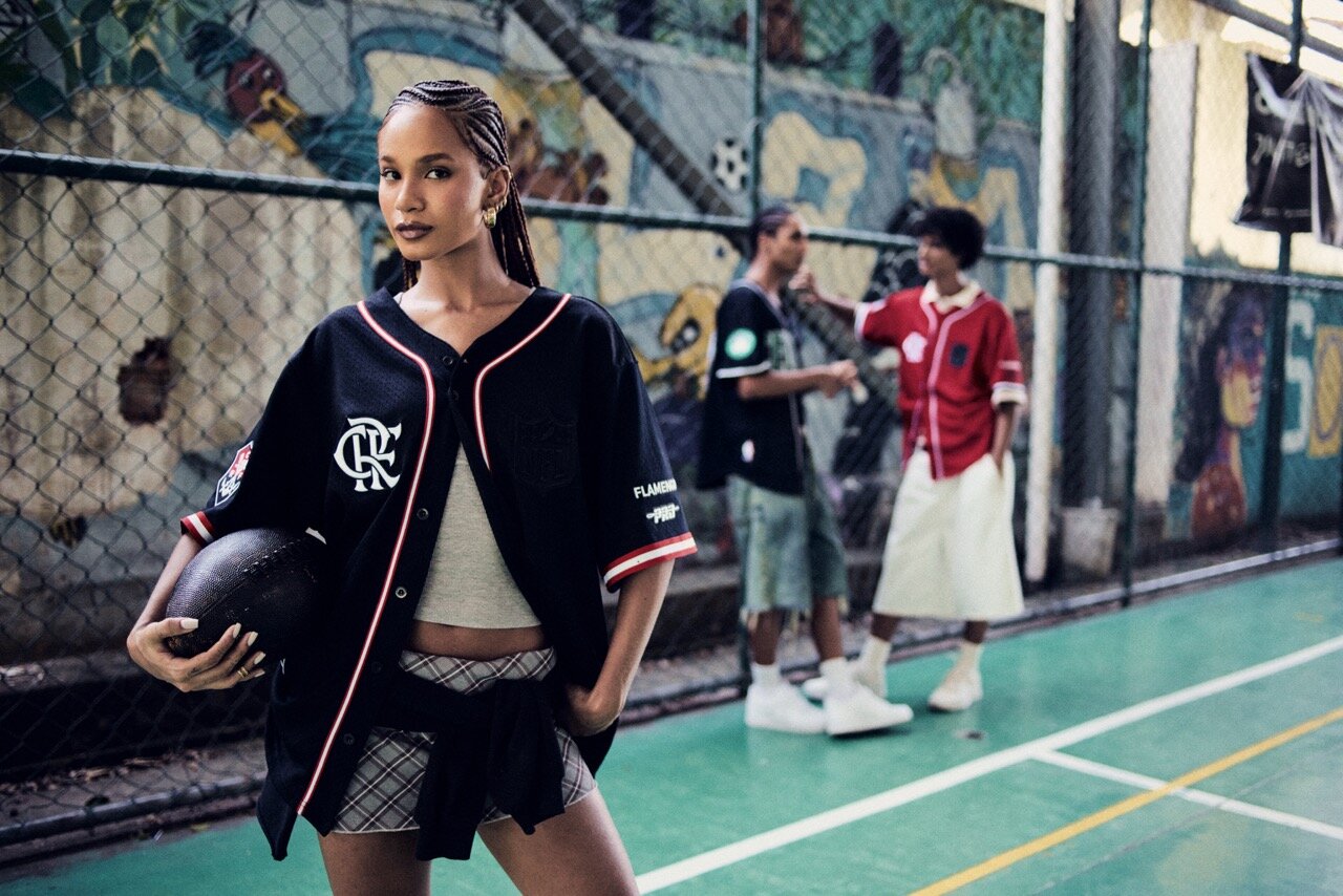 ProStandard NFL × Flamengo campaign, model with an American football on a neighborhood court, crew behind