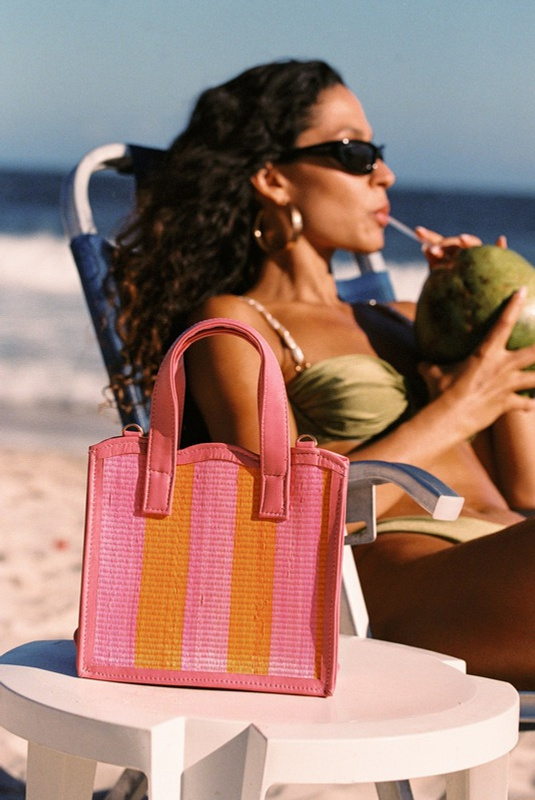 Soli&Sun campaign, beach chair with the bag and a coconut
